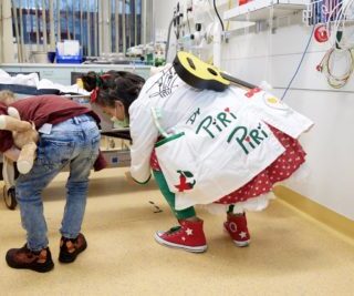 Swiss Giggle Doctor (also called Trauma Doctor) in play action with a little patient