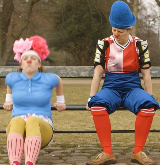 Danish Clowndoctors show warm-ups for a clown race.